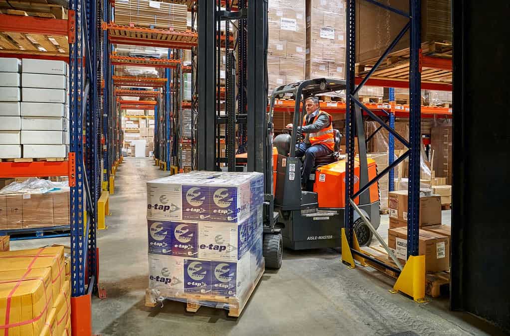 Forklift truck moving pallets